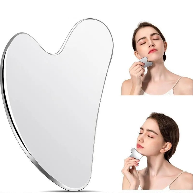 Woman using a heart-shaped gua sha and skincare tool on a white background