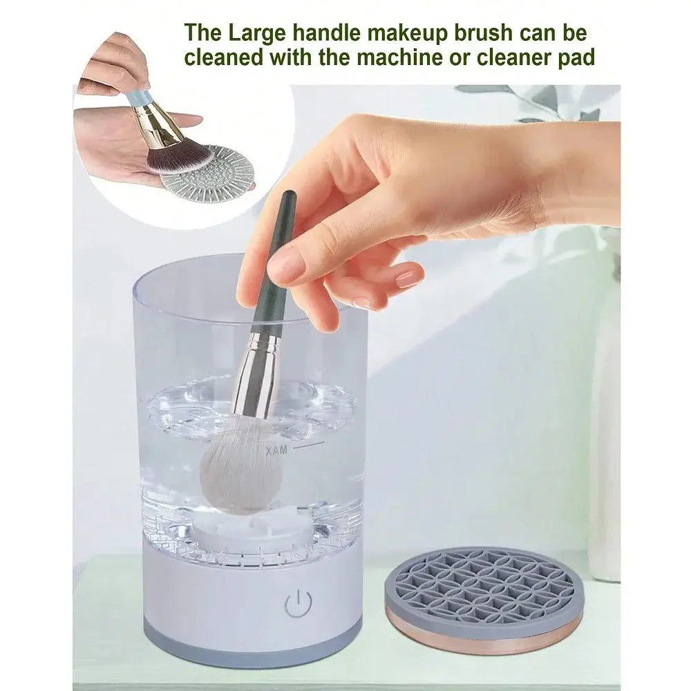 Makeup brush cleaning machine with a hand holding a brush and a cleaning pad.