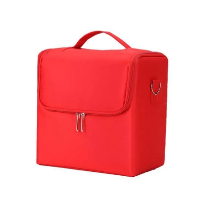 Red makeup organizer bag with a handle on a white background