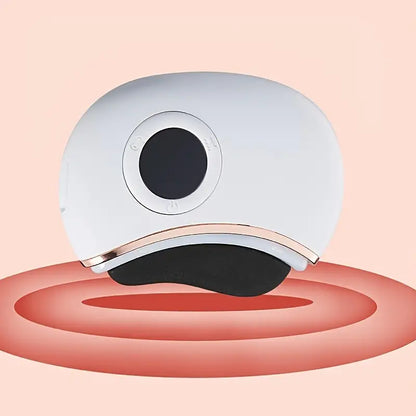 White electronic gua sha device with black component on a pink background
