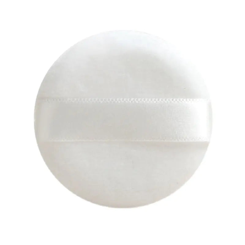 White ceramic plate with a subtle pattern on a white background