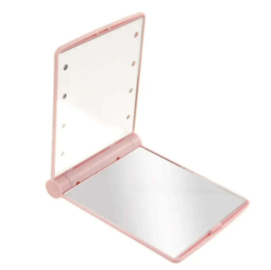 Compact mirror with pink frame on a white background