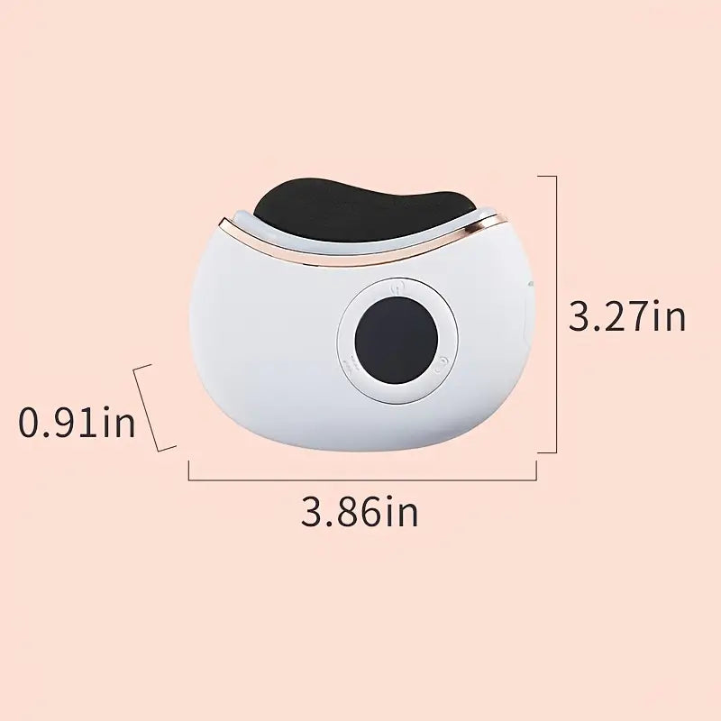 Small round gua sha device with black top and measurements on a beige background