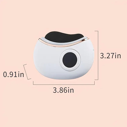 Small round gua sha device with black top and measurements on a beige background