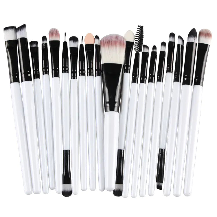 Set of 20 makeup brushes with black and white handles on a white background
