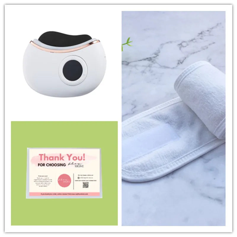 White electronic device with black component, white towel on marble surface, and 'Thank You' card.