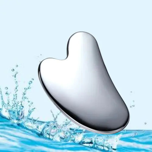 Metallic Gua Sha tool with water splash background
