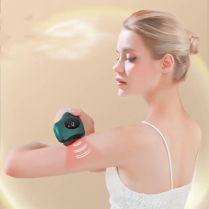 Woman using a handheld gua sha electronic device on her arm with a glowing effect