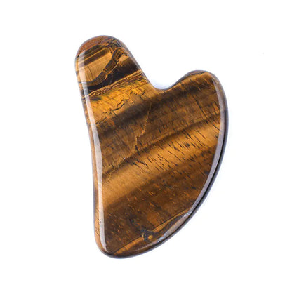 Tiger's eye gua sha tool on a white background