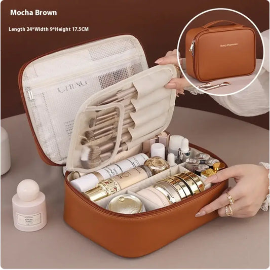 Brown travel makeup case with cosmetic items on a neutral background