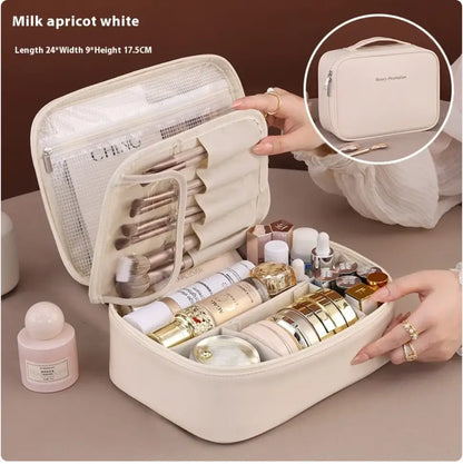 Milk apricot white cosmetic bag with makeup items on a brown background