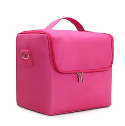 Pink makeup organizer bag with a handle on a white background