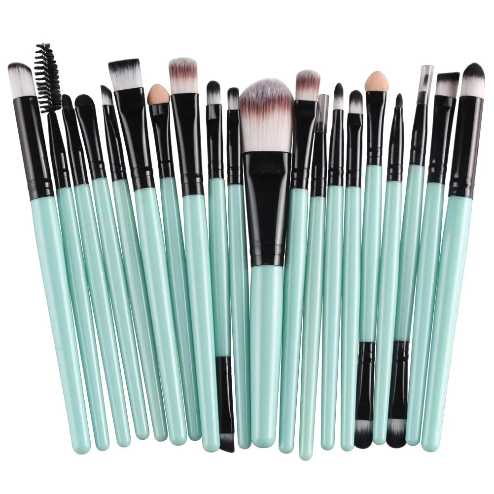 Set of makeup brushes with green handles on a white background - 20 pcs