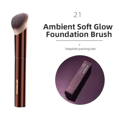 Hourglass Ambient Soft Glow Foundation Brush with packaging on a white background