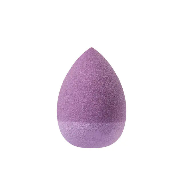 Purple makeup sponge on a white background