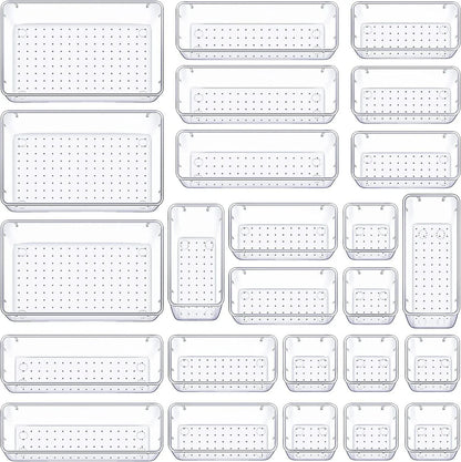 Grid of clear plastic trays with holes on a white background