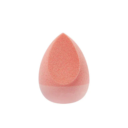 Orange makeup sponge on a white background