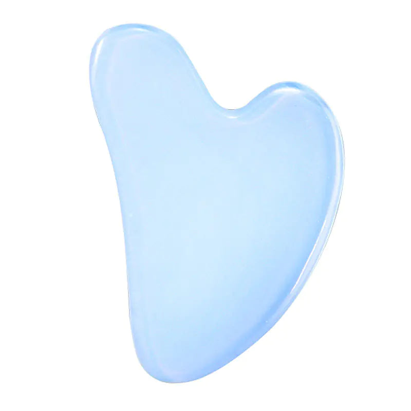 Blue gua sha tool on a white background