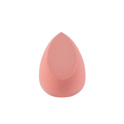 Pink makeup sponge on a white background