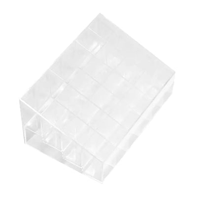 Clear plastic organizer with multiple compartments on a white background