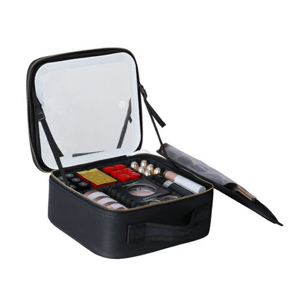 Black makeup case with open lid displaying various cosmetic items on a white background
