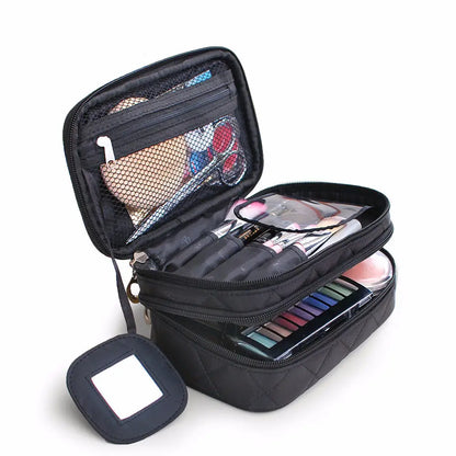 Black makeup travel case with various cosmetic items on a white background