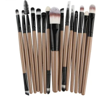 Set of makeup brushes with black and brown handles on a white background