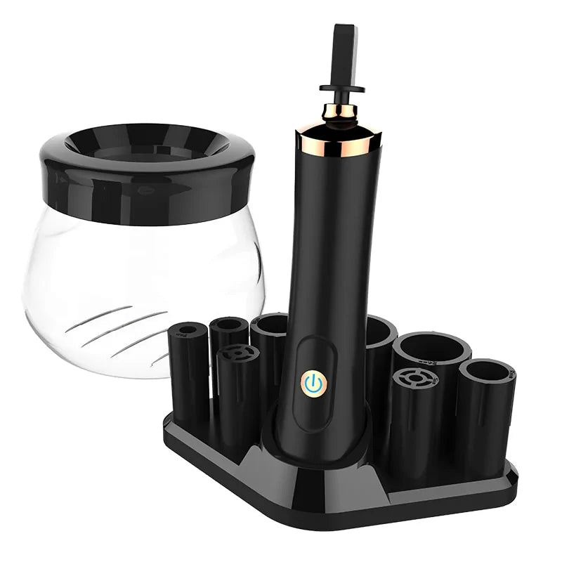 Black makeup brush cleaner tool with attachments on a white background