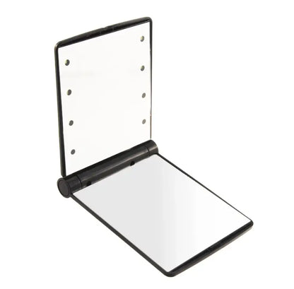 Compact mirror with black frame on a white background